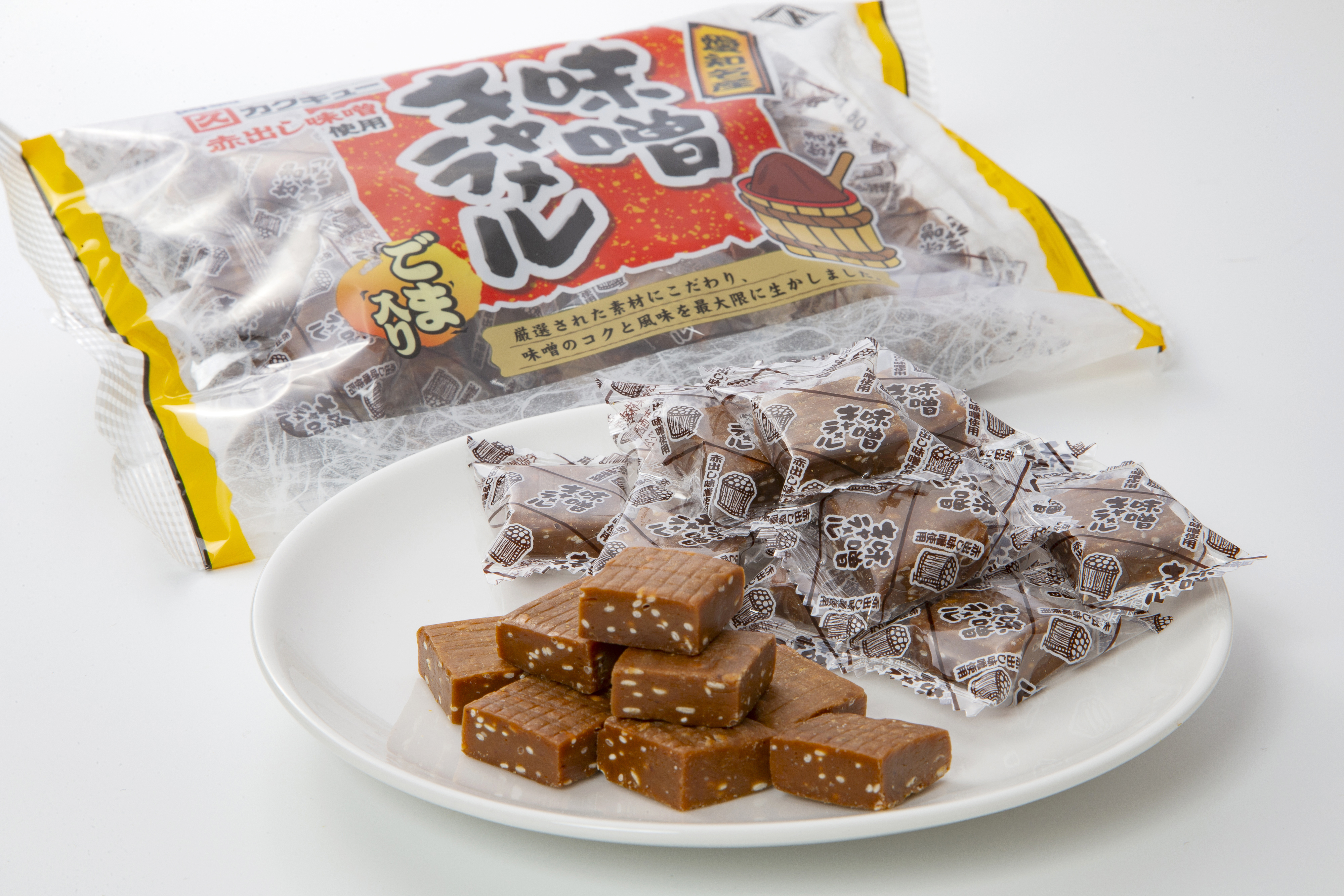Miso Caramel bag, wrapped caramels and unwrapped pieces on a plate