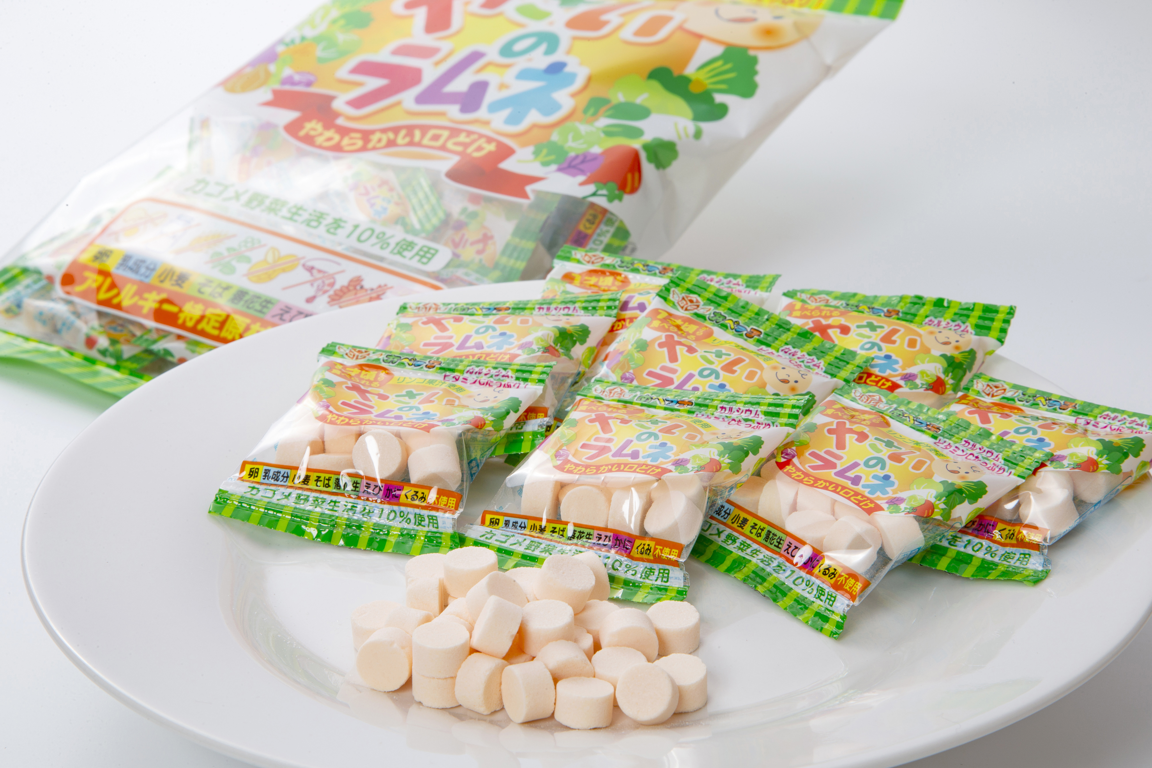 Pastel ramune pieces and individual packs, showing the candy inside
